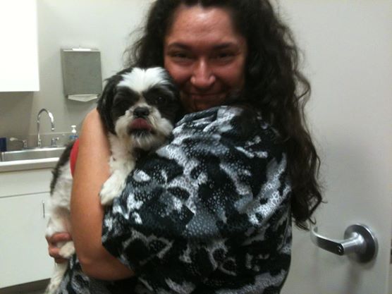 Vet Tech Becky and Loki celebrate Loki's clean bill of health!